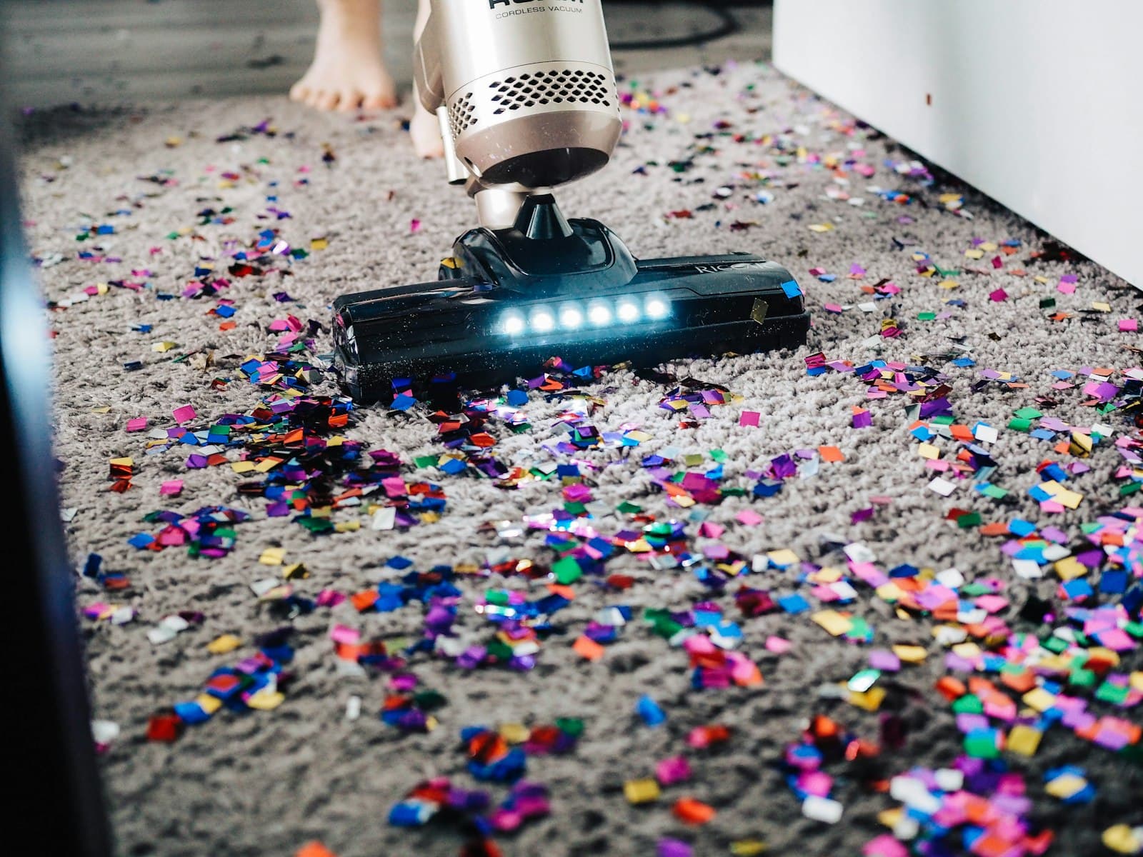 Vacuum cleaner cleaning a carpet